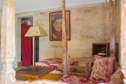 Ένα ή περισσότερα κρεβάτια σε δωμάτιο στο Bel en rouge