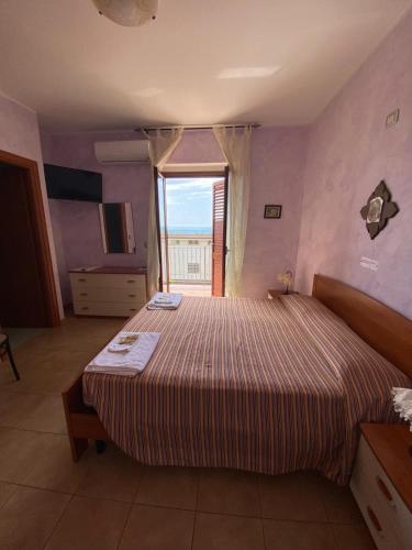 Ένα ή περισσότερα κρεβάτια σε δωμάτιο στο Bed and Breakfast Victoria