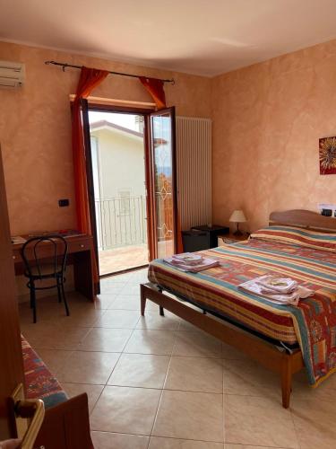 Ένα ή περισσότερα κρεβάτια σε δωμάτιο στο Bed and Breakfast Victoria