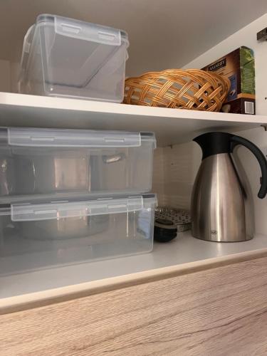 an open refrigerator drawer with a tea kettle on it at Frankenberg-am-Wald Frankenberg an der Eder in Frankenberg