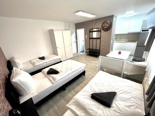 En eller flere senge i et værelse på City Ferienwohnung direkt an der U-Bahn