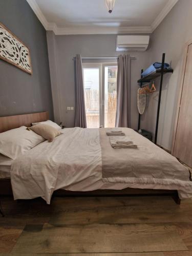 Posteľ alebo postele v izbe v ubytovaní Closer "Egnatia Studio 5"