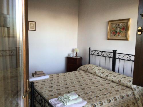 Letto o letti in una camera di Villa Martina