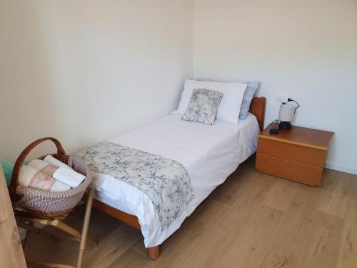 Postel nebo postele na pokoji v ubytování CasaNegrano - Apartaments