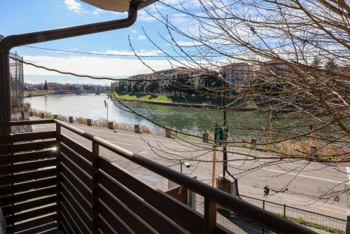 a view of a river from a balcony at Alla Riva in Verona