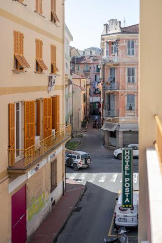 a view of a city street from a building at Hotel POSTA - 2 stars - Comfortable Stay in Ventimiglia in Ventimiglia
