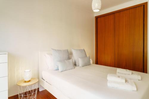 Ένα ή περισσότερα κρεβάτια σε δωμάτιο στο GuestReady - Villa Valverde in Caniço