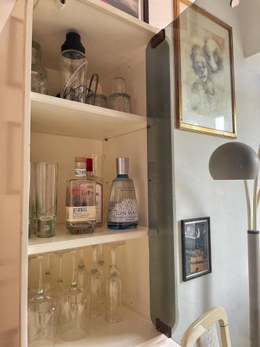 a cupboard filled with lots of glass jars at Amiata Escape in Arcidosso