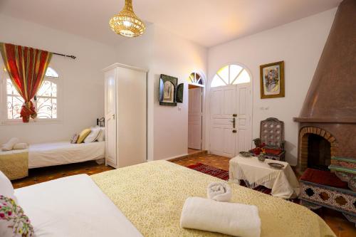 Postel nebo postele na pokoji v ubytování Aura Retreat