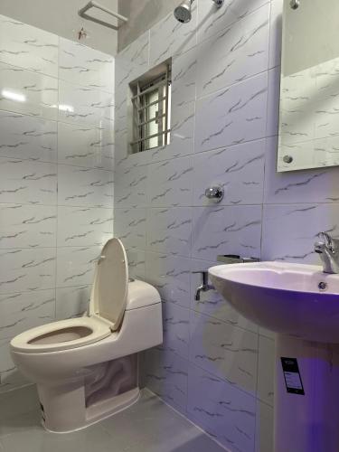 Ένα μπάνιο στο Hotel Sunrise Residential