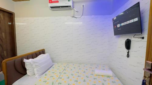 Ένα ή περισσότερα κρεβάτια σε δωμάτιο στο Hotel Sunrise Residential