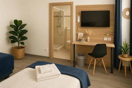 Postel nebo postele na pokoji v ubytování Sunny Hotel Straubing