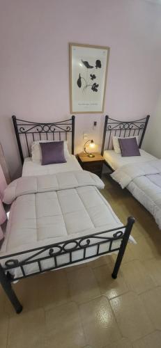 Кровать или кровати в номере Margarita rooms