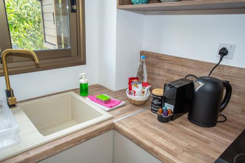 Kuchyň nebo kuchyňský kout v ubytování estéa Melina's Summer Townhouse