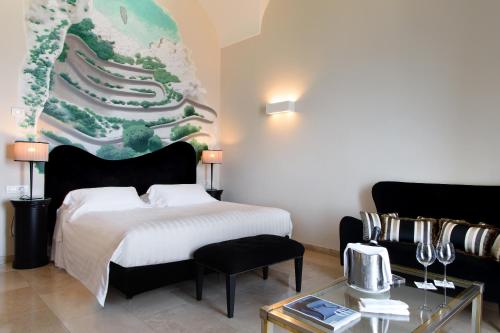 Posteľ alebo postele v izbe v ubytovaní Villa Marina Capri