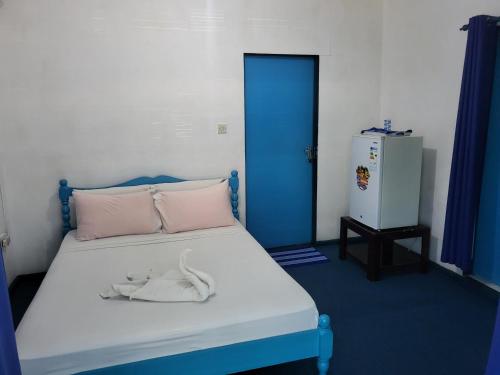Postel nebo postele na pokoji v ubytování Le Chateau Bleu