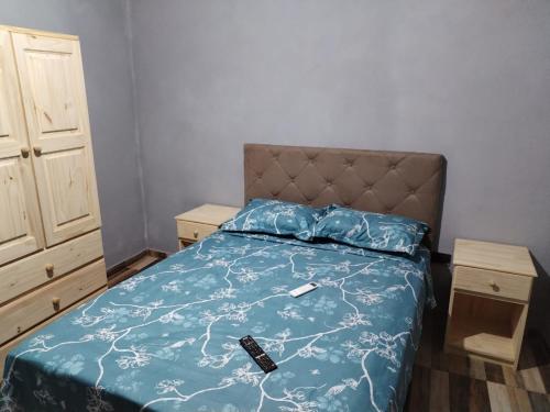 Ένα ή περισσότερα κρεβάτια σε δωμάτιο στο Departamentos selva Iguazú