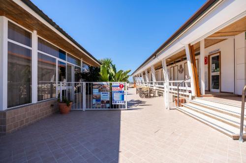 a building with a walkway in front of it at Appartamento Luxury vista mare in Lido di Camaiore