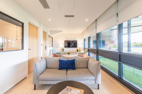 a living room with a couch and a table at The SPACE To Stay, St Andrews in St. Andrews