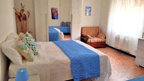 Una cama o camas en una habitación de Noli Easy Stay