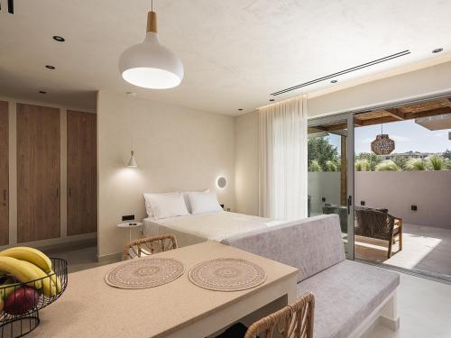 Ένα ή περισσότερα κρεβάτια σε δωμάτιο στο Vanilla Suites
