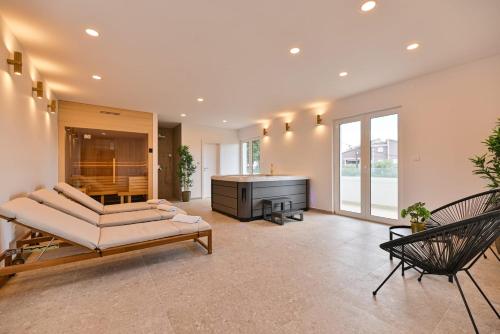 Posezení v ubytování Villa Rozana - Beachfront Wellness Retreat