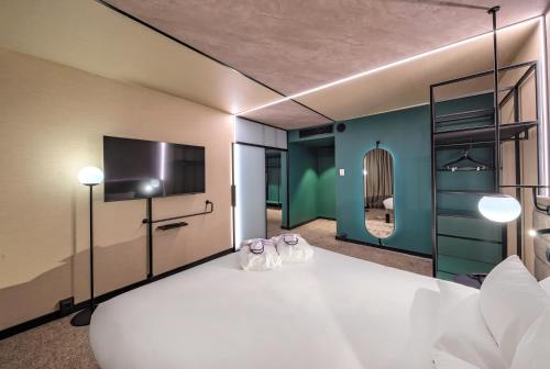 Katil atau katil-katil dalam bilik di Novotel Kraków Centrum