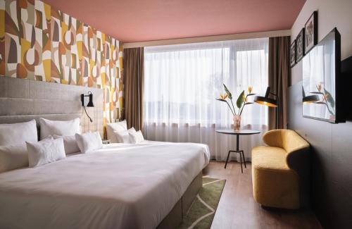 Postel nebo postele na pokoji v ubytování NYX Hotel Berlin Köpenick by Leonardo Hotels