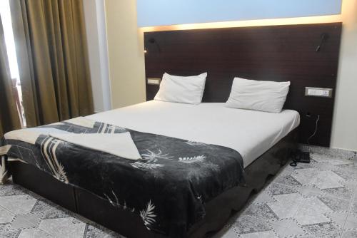 Postel nebo postele na pokoji v ubytování Shorelux Beach Resort