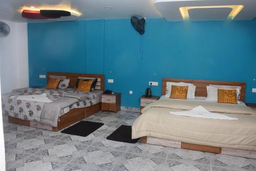 Postel nebo postele na pokoji v ubytování Shorelux Beach Resort