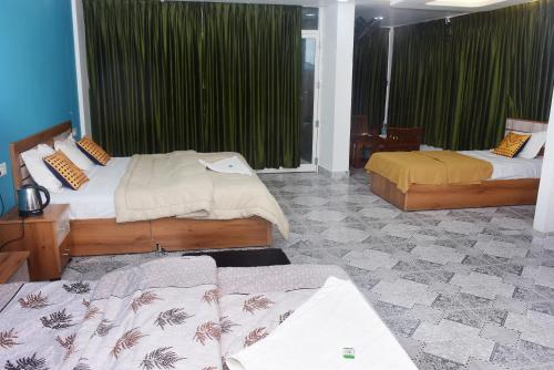 Postel nebo postele na pokoji v ubytování Shorelux Beach Resort
