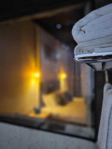 Postel nebo postele na pokoji v ubytování Grotta Resort