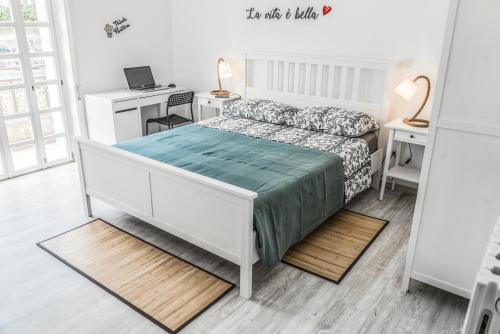 En eller flere senge i et værelse på Casa Mare View Wi-Fi AC