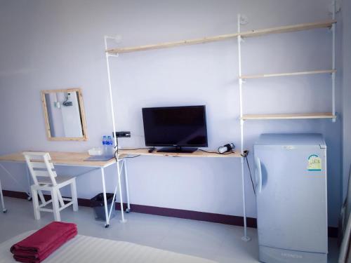 Televisyen dan/atau pusat hiburan di Rinrada Loft Resident