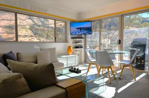 Un lugar para sentarse en Alpine View Apartments