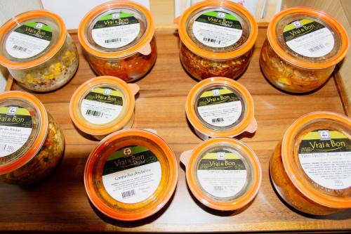 a bunch of jars of food sitting on a table at B&B HOTEL Montélimar Sud in Montélimar