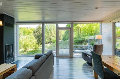 a living room with a couch and a table at 2 bis 4 Personen F1H3 in Ruhla