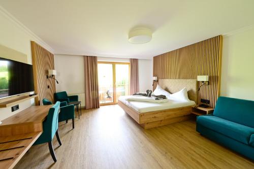Postel nebo postele na pokoji v ubytování Ferienhotel Hofer superior