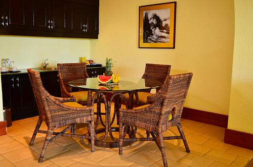 a dining room with a table and chairs in a kitchen at Thunderbird Resorts - Rizal in Binangonan