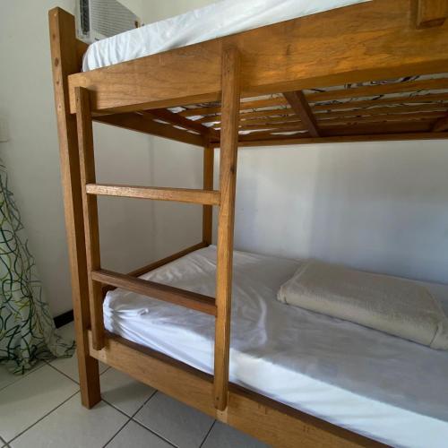 a couple of bunk beds in a room at Hostel ABC in Angra dos Reis