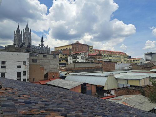 a view from the roof of a city with buildings at Casa CarpeDM in Quito