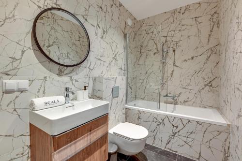 Ένα μπάνιο στο Scala City Center Apartments & Studio by Lion Apartments