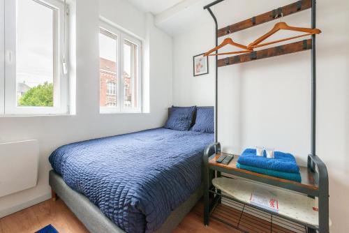 Una cama o camas en una habitación de SV2A-Location
