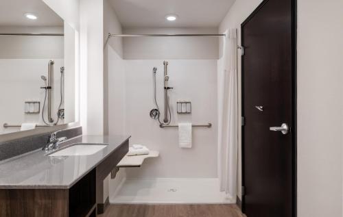 a bathroom with a sink and a shower at My Place Hotel-Las Vegas South/Henderson, NV in Las Vegas
