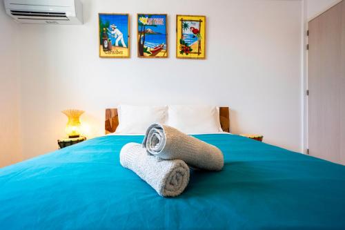 Postel nebo postele na pokoji v ubytování Villa en bord de mer, vue mer au Diamant