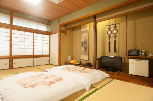Cama o camas de una habitación en Masunoi