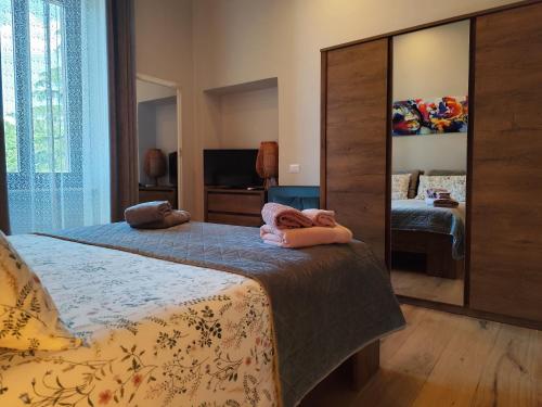 Postel nebo postele na pokoji v ubytování Casa Divitia