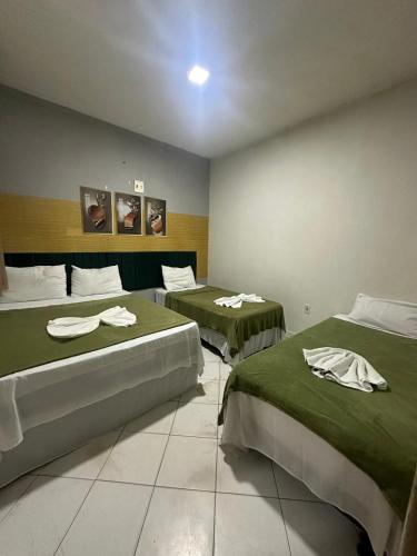 Postel nebo postele na pokoji v ubytování Lua Hotel