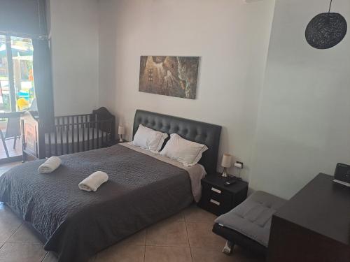 Postel nebo postele na pokoji v ubytování Sea View Apartment