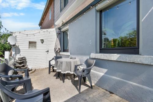 Balkoni atau teres di Modern House "Brick Lane" with Terrace and Wintergarden - LOFTIGO
